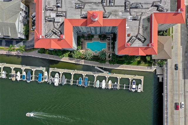 birds eye view of property featuring a water view