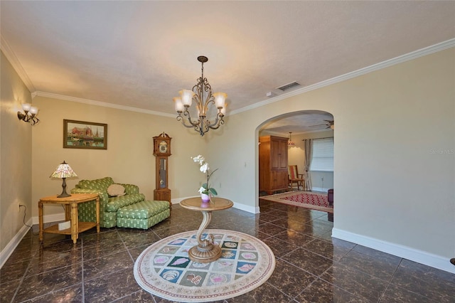 sitting room featuring ceiling fan with notable chandelier and crown molding