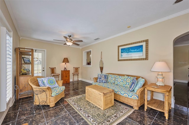 living room with ceiling fan, a healthy amount of sunlight, and crown molding