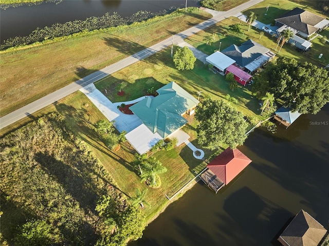 drone / aerial view featuring a water view