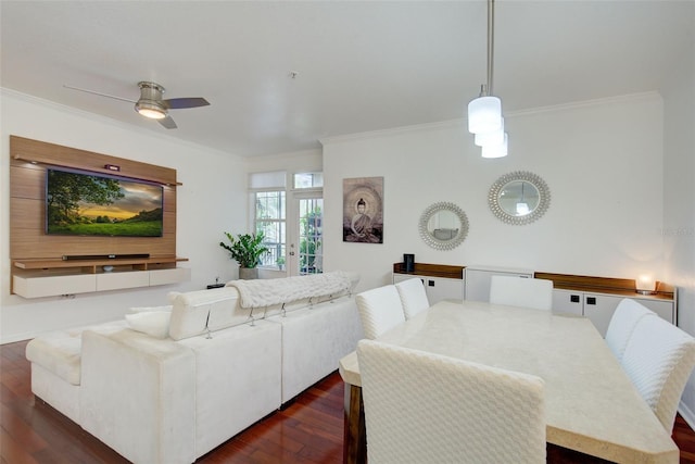 dining area with ceiling fan, dark hardwood / wood-style flooring, and crown molding