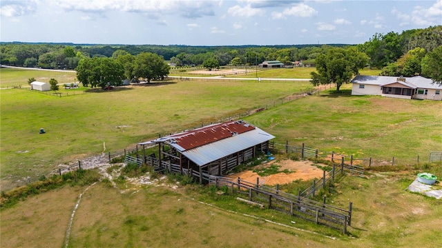 birds eye view of property featuring a rural view