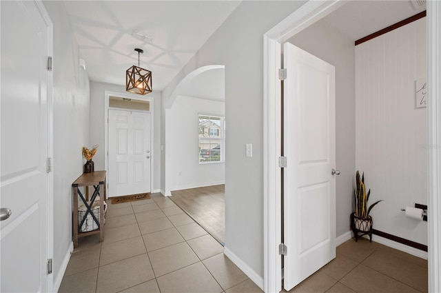 foyer featuring light tile floors