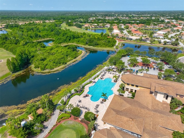 birds eye view of property with a water view