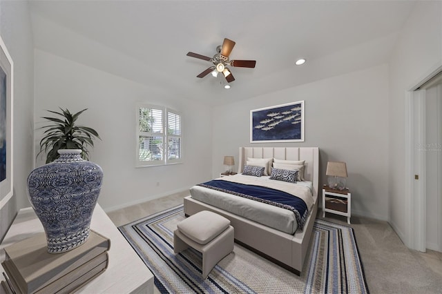 bedroom with ceiling fan and carpet floors