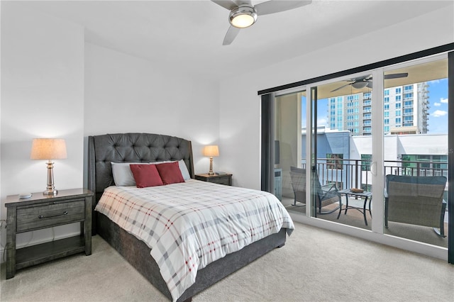 bedroom featuring ceiling fan, access to exterior, and carpet floors