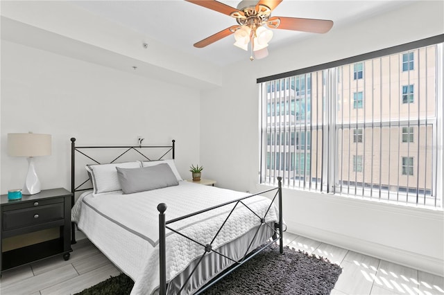 bedroom featuring ceiling fan