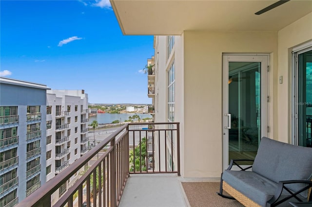 balcony featuring a water view