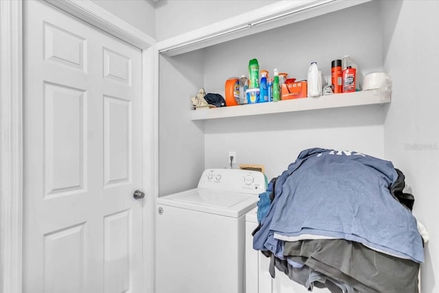 laundry room featuring washer / dryer