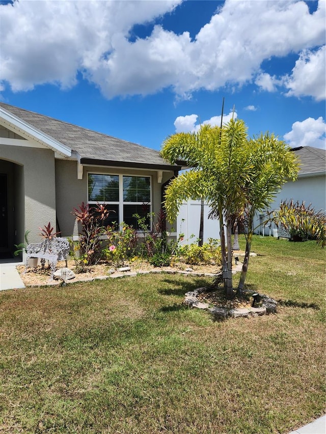 view of front of home with a front yard