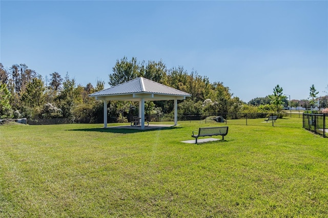 view of home's community with a gazebo and a lawn