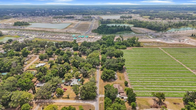 aerial view featuring a rural view and a water view