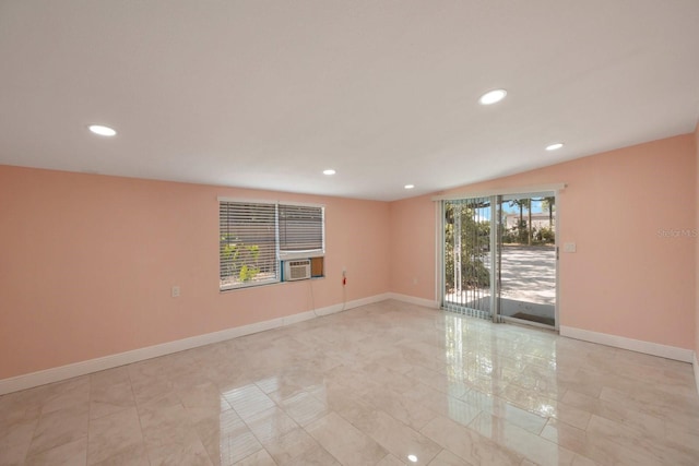 tiled spare room featuring a healthy amount of sunlight