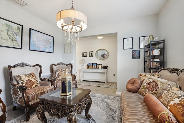 tiled living room featuring an inviting chandelier