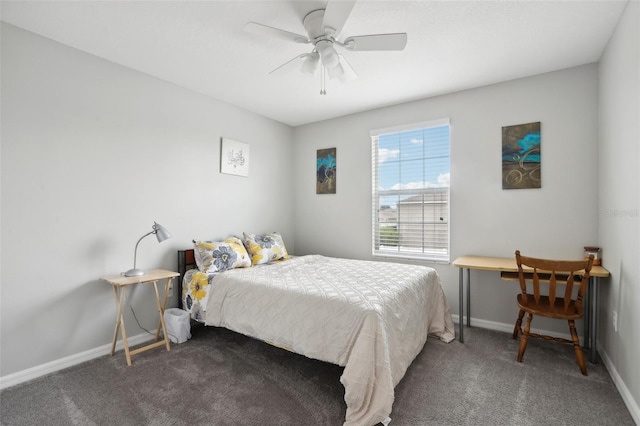 bedroom featuring dark colored carpet and ceiling fan