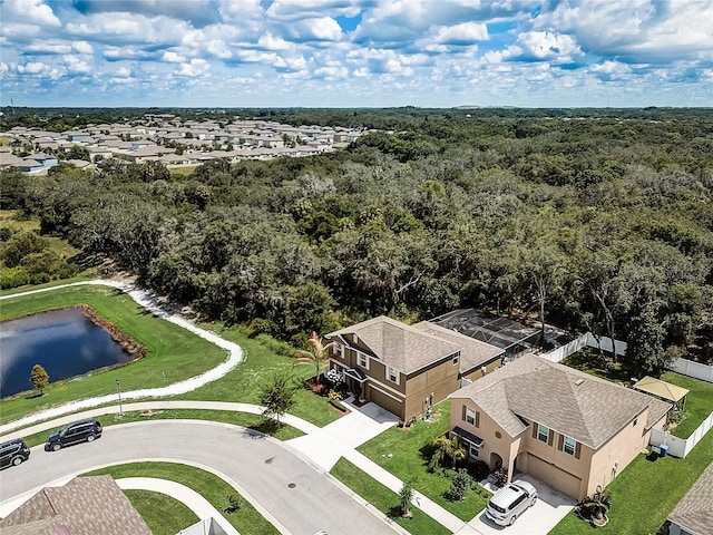 bird's eye view with a forest view and a residential view