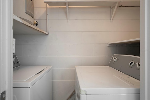 washroom with washer and clothes dryer