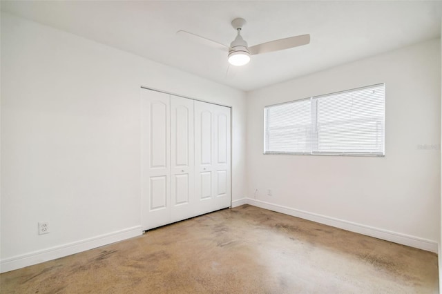 unfurnished bedroom with carpet flooring, a closet, and ceiling fan