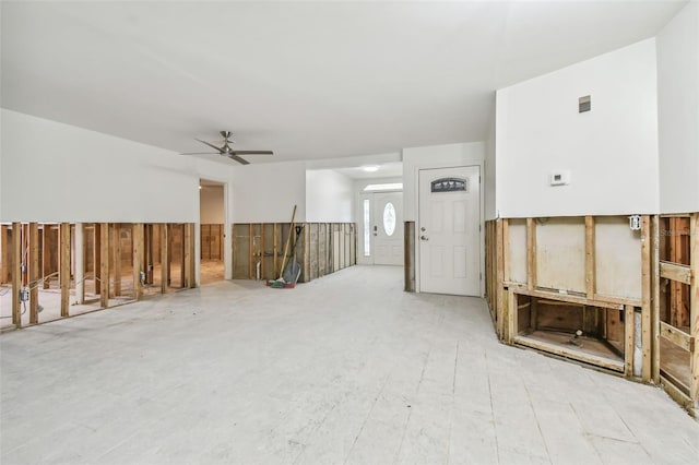 interior space featuring ceiling fan and light wood-type flooring