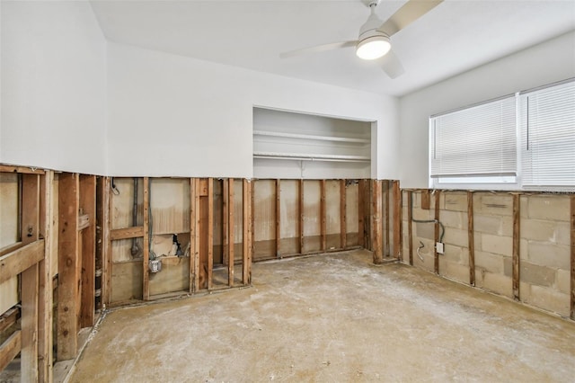 interior space featuring ceiling fan