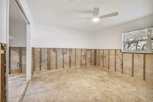 basement featuring ceiling fan