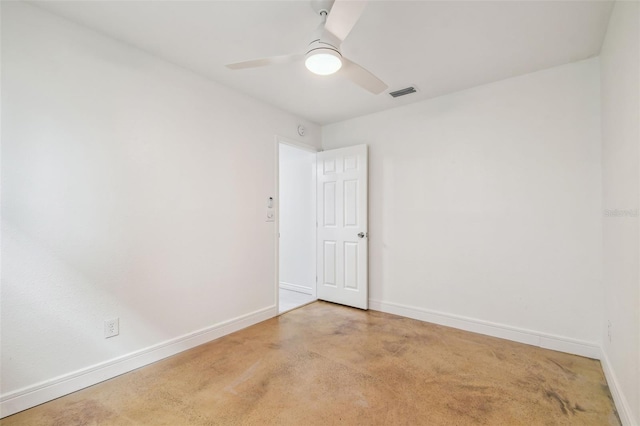 spare room featuring carpet floors and ceiling fan