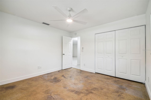 unfurnished bedroom featuring carpet flooring, a closet, and ceiling fan