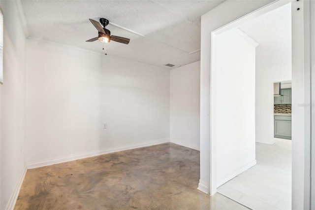 unfurnished room featuring a textured ceiling and ceiling fan