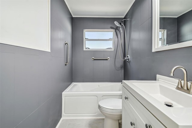 full bathroom featuring shower / bathing tub combination, vanity, and toilet