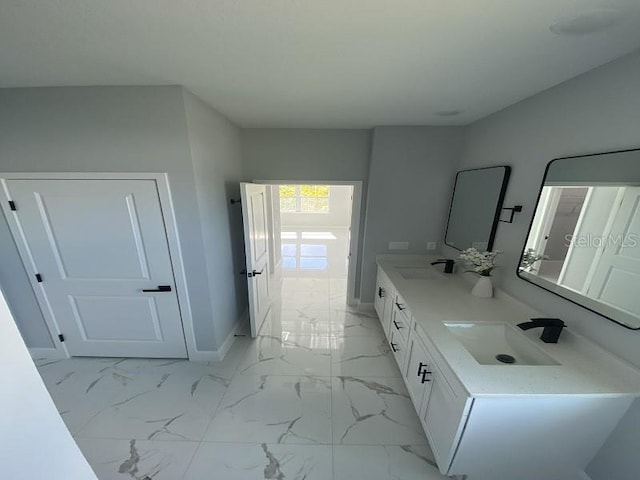 bathroom featuring tile flooring and double sink vanity