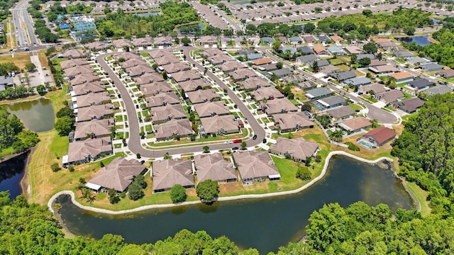 drone / aerial view with a water view