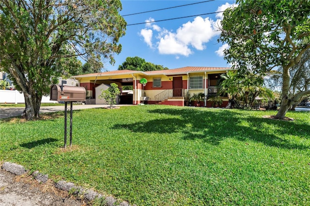 ranch-style house with a carport and a front lawn