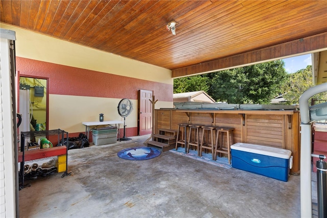 view of patio / terrace featuring an outdoor bar