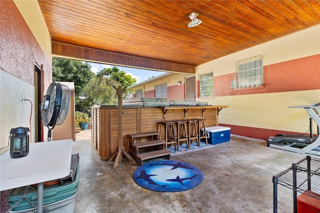 view of patio featuring exterior bar