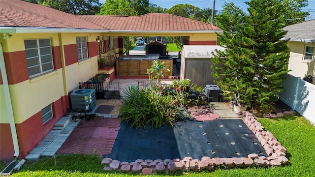 exterior space with central AC unit and exterior kitchen