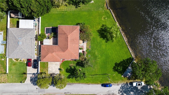 drone / aerial view with a water view