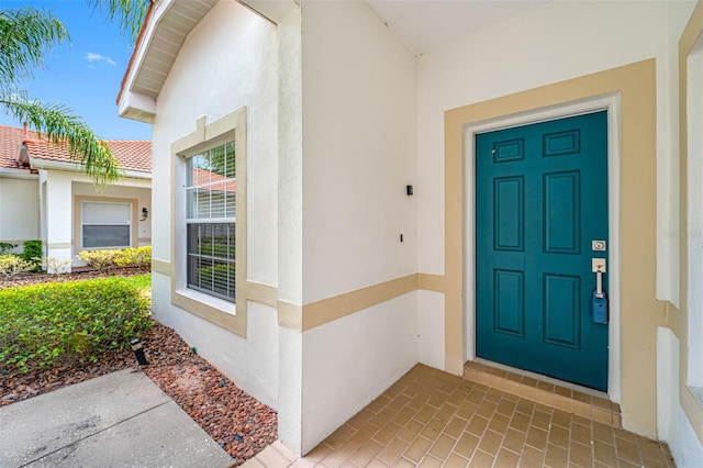 property entrance with a garage