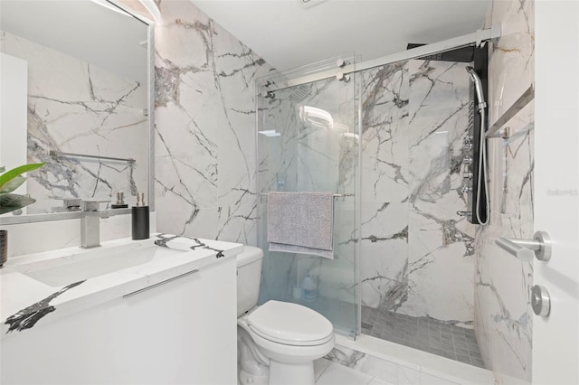 bathroom featuring tile flooring, an enclosed shower, tile walls, toilet, and vanity