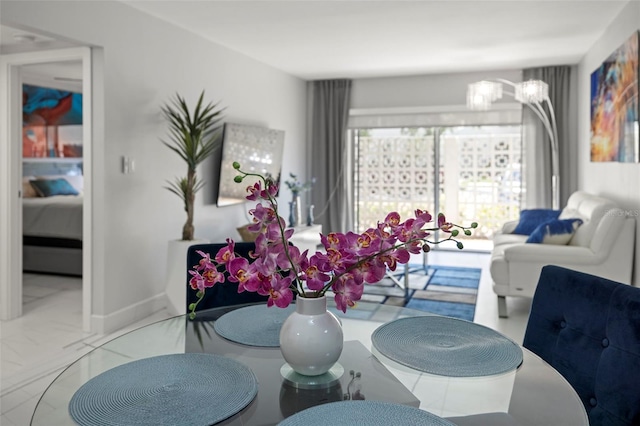 dining space featuring tile flooring