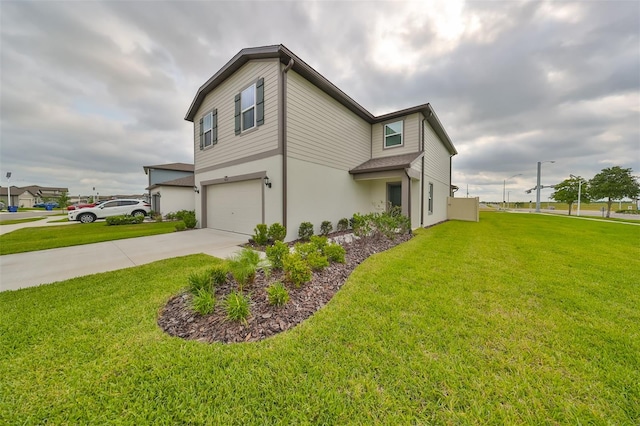 view of side of property with a yard and a garage