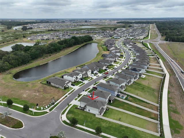 drone / aerial view with a water view