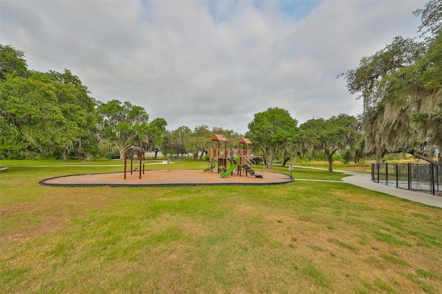 view of playground featuring a yard