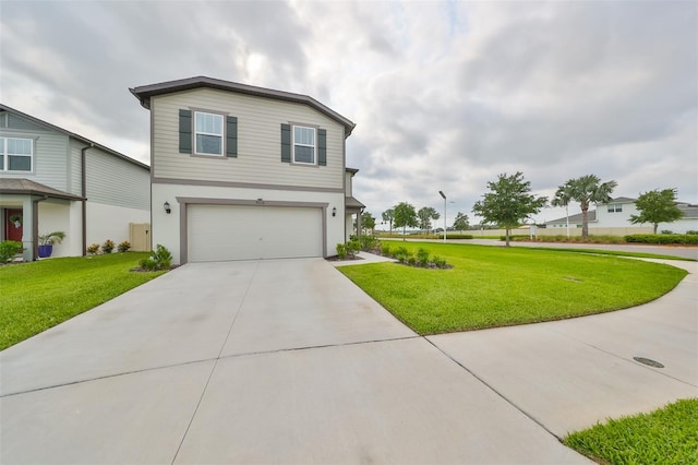 view of front of property with a garage and a front yard