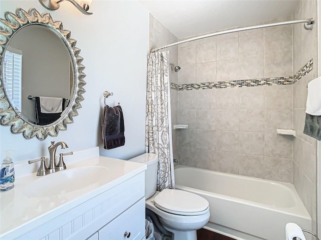 full bathroom featuring shower / bathtub combination with curtain, vanity, and toilet