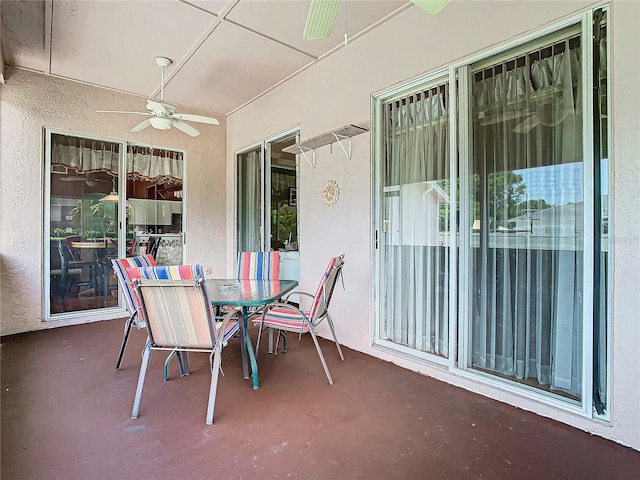 view of patio featuring ceiling fan