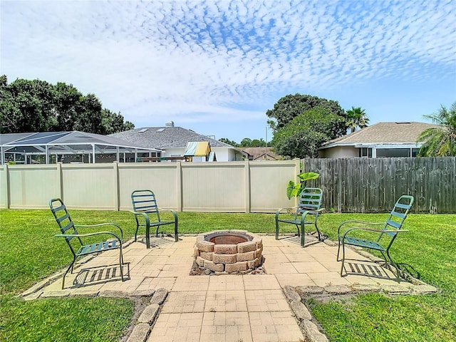 view of patio with a fire pit