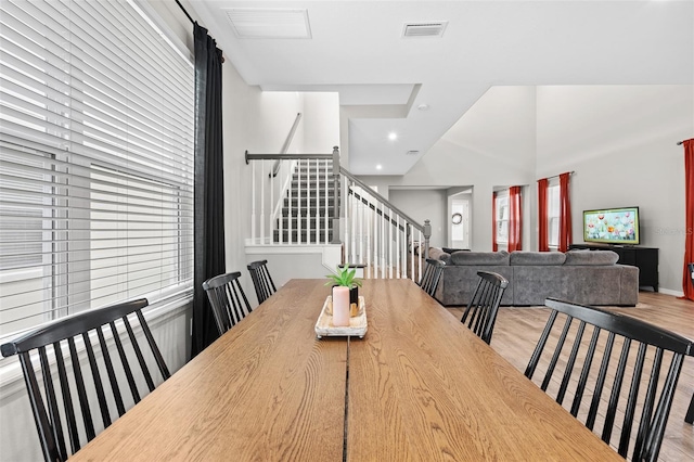 dining space featuring light hardwood / wood-style floors