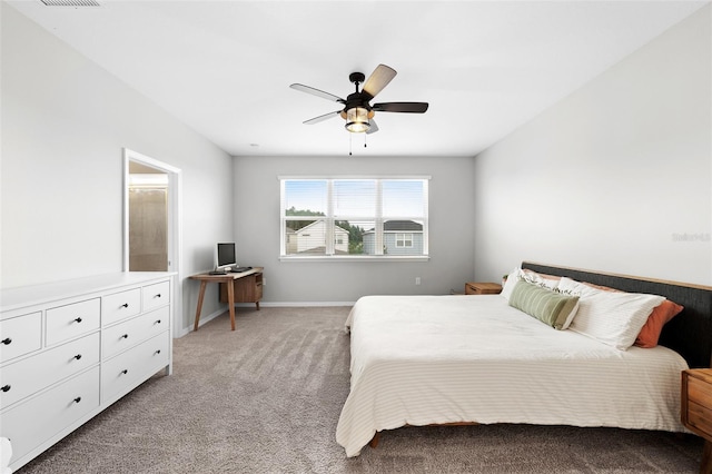 bedroom featuring ceiling fan and light colored carpet