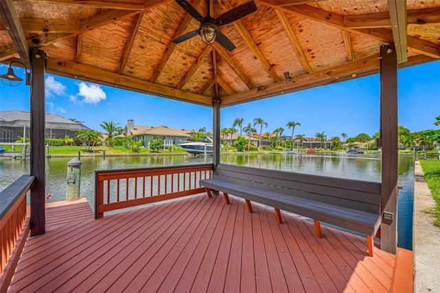 dock area with a gazebo and a water view