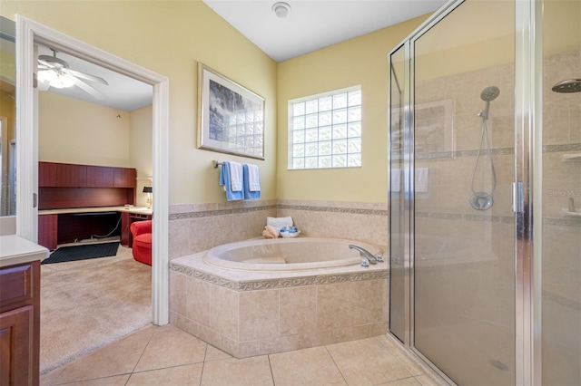 bathroom featuring tile patterned flooring, ceiling fan, separate shower and tub, and vanity